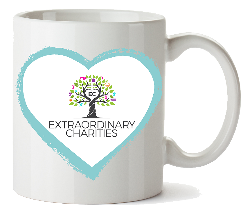 White coffee mug with a blue heart and Extraordinary Charities logo featuring a colorful tree and text