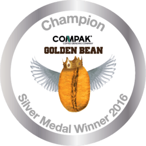 Bali Blue Moon coffee, organic medium dark roast with exotic stone fruit and chocolate notes, award-winning blend.