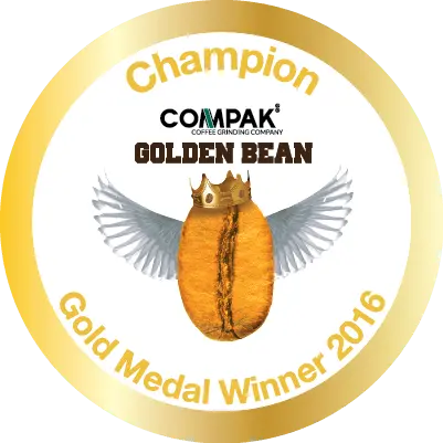 Gold Medal Winner 2016 Compak Golden Bean Champion badge with crowned coffee bean and wings representing Ethiopia Natural Process coffee award