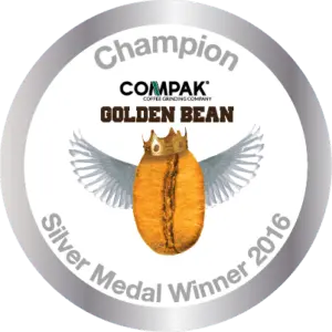 Bali Blue Moon coffee, organic medium dark roast with exotic stone fruit and chocolate notes, award-winning blend.