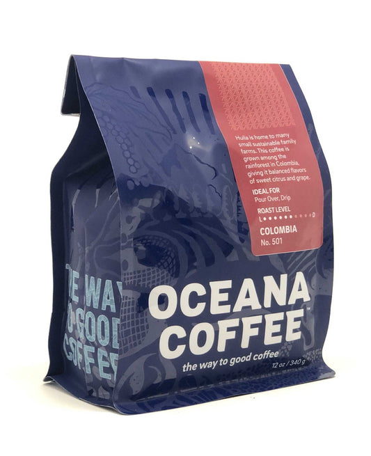 Colombia - Planadas coffee bag with rich flavor notes of orange, caramel, and cherry.
